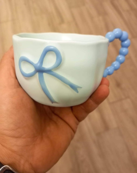 فنجان بتصميم ناعم ومميزمع رسومات  مرتبة